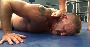 Nude men fuck in the ring after a rough bondage play