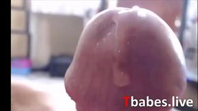 Beautiful blonde shemale plays with her big cock in pink panties until she cums