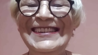 "Beautiful vagina of granny Angela. Showing the inside"