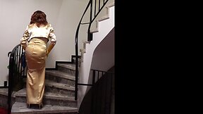 Urgent: lady in gold satin needs help!