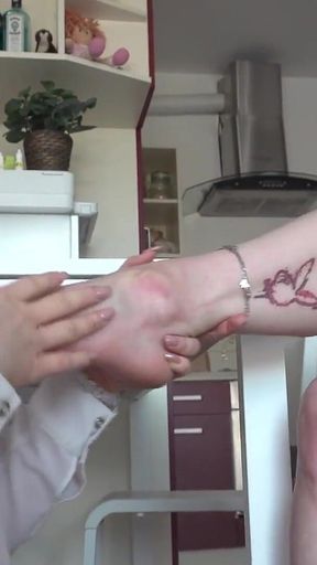 A Redhead Secretary with a Hot Tattooed Body Gets Her Feet Licked by Her Colleague