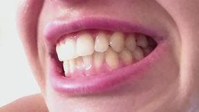 bite with sharp white fangs