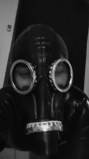 Rubber slave play with big dildo