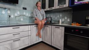 Mature Redhead Iris Showing Legs and Feet in Tan Pantyhose Tease