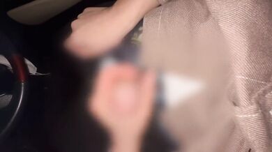 Big tits wife strokes his cock hard while driving home handjob