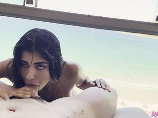 BitchSelena - Brunette hair with a large rimming her anus on the beach