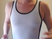 Work out in wrestling singlet, plays with his thick pierced cock and shoots his load