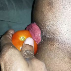 Ass with tomatoes