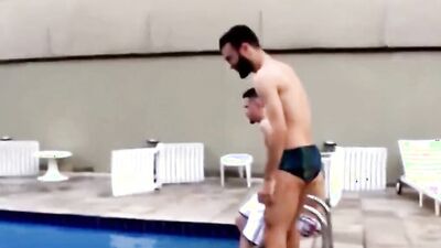 Fit Latin dude double penetrated by two studs after swimming