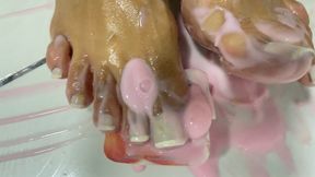 smearing yogurt on her feet to stuff in her mouth