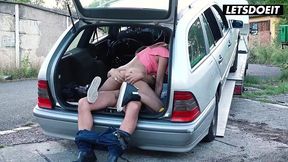 Slim babe gets a public car trunk fuck