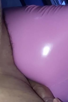 Shiny latex asss teasing my cock and pissing in her ass