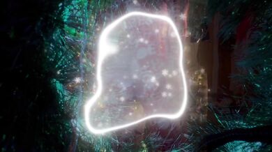 Stuck under the Christmas tree looking for a present and got it right in her hand