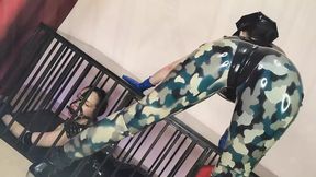 Latex Officer Fucks His Latex Prisoner with a Strap-on