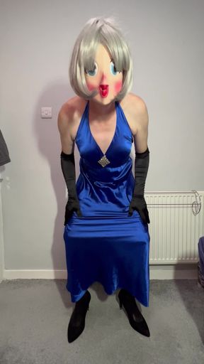 Sissy crossdresser playing in a satin ball gown