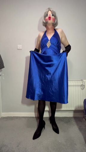 Sissy crossdresser playing in a satin ball gown