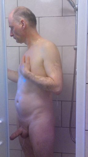 British man wanking in the shower getting horny then rubbing himself dry with a towel   Clip 1