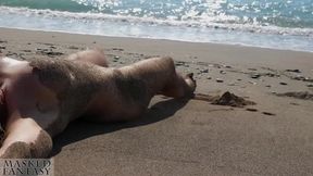 Sexy woman with a dirty pussy at a secluded beach with see through white top