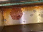 Taking a piss at an old urinal trough