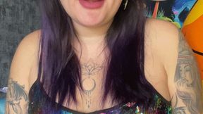 girl with shine makeup in dress poping foil balloons