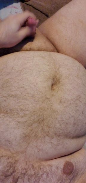 Fat guy jacks off