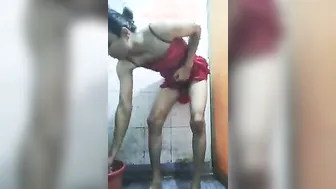 Indian crossdresser strips naked in bathroom shower and shows off body