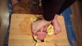 Crushing bananas barefoot on the face