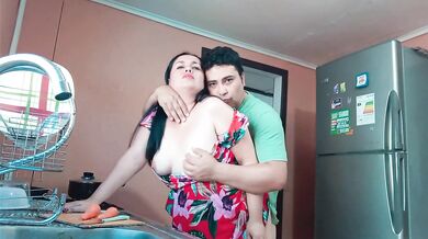 Stepmom cutting vegetables with her tits out and fucked by her horny stepson in the kitchen