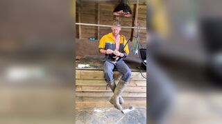 Farmer smokes and jacks himself on a break