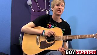 Teenage man plays guitar before cock masturbating and bursting up