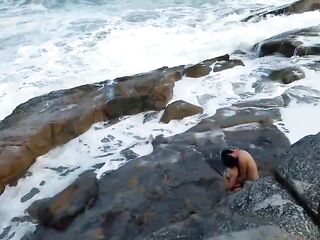 Amateur brunette hair is groaning whilst getting her cunt licked by a stranger, on the beach
