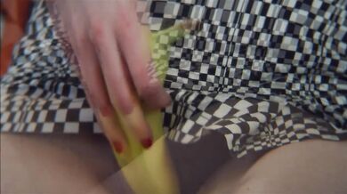 Punk dyed hair girl deep throats banana in see through mini skirt