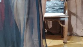 A sensually dressed mature woman crosses her big legs while dangling her high heels (1)