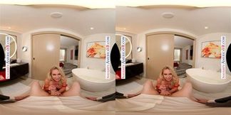 Blonde Pornstar Sadie Summers wears lingerie before riding your cock in VR