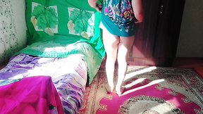 Sassy tranny CD in green mini dress with massive butt