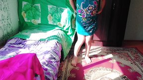 Sassy tranny CD in green mini dress with massive butt