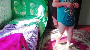Sassy tranny CD in green mini dress with massive butt