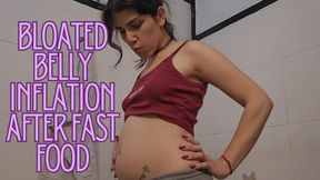 Bloated belly after eating fast food and doing inflation