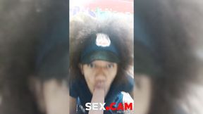 ”Curly police officer with blue eyes sucks a big dildo for her colleagues.”