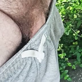 Playing outdoors with flaccid cock