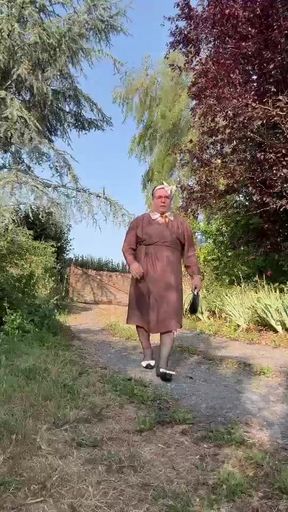 Wearing a brown Portefeuille-style dress for an evening
