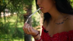 Seductive Russian Beauty Smoking Slim Cigarette Outdoors
