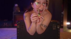 Babe in glasses really loves to play with both her holes on these toys