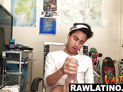 Tattooed Latino twink tugs his fat dick till eruption