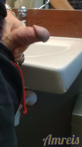 I pulled out my cock in the shopping mall restroom.