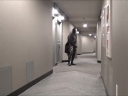 jerking off in hotel hall in wetsuit and trench coat