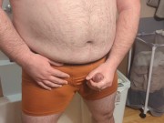 Bear In Orange Boxer Briefs Cumming on the Bathroom Floor