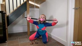 Neoprene Suit, Chains & Face‑cum Tease