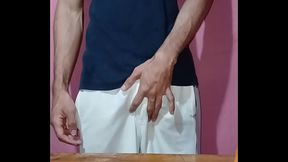 Young muscular guy with hard cock strips and jerks off