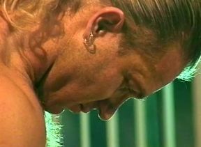 Blonde babe with big fake tits gets fucked on the bed